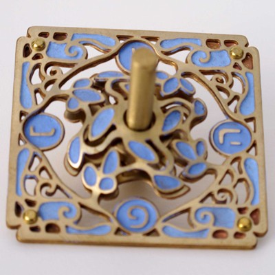 Square Brass Dreidel with Light Blue Flowers, Circles and Hebrew Text